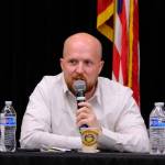 Democrat Jonathan Kreiss-Tomkins, a candidate for governor, speaks at a debate on education on July 30, 2026. (Photo by Corinne Smith/Alaska Beacon)
